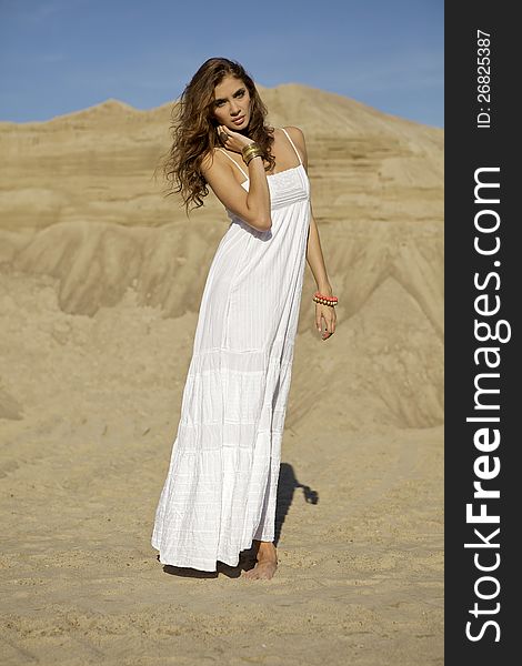 Attractive And Sensuality Woman In The Desert