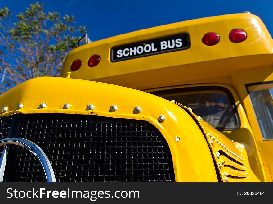 Front of Yellow School Bus with Blue Sky