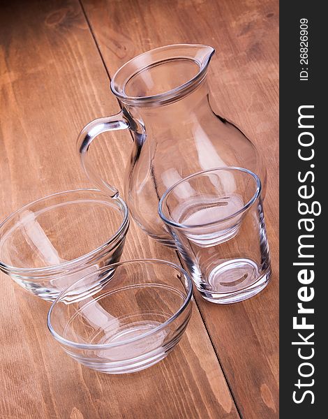 Empty clean glassware on a wooden table