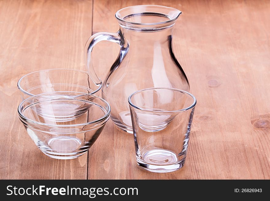 Empty clean glassware on a wooden table