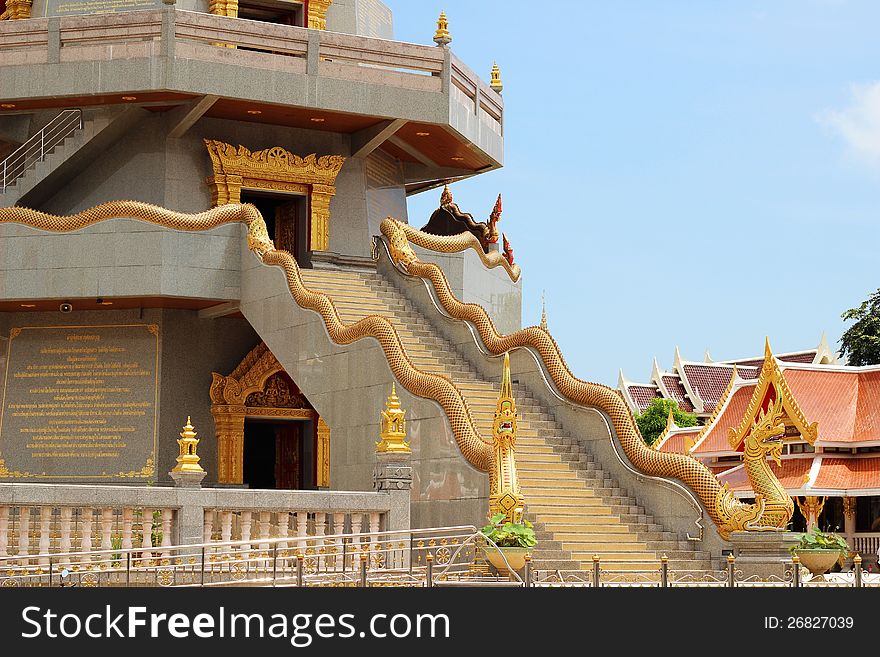 Staircase with Naka leading to room of pagoda, at Thai Buddhist temple in Northeast of Thailand