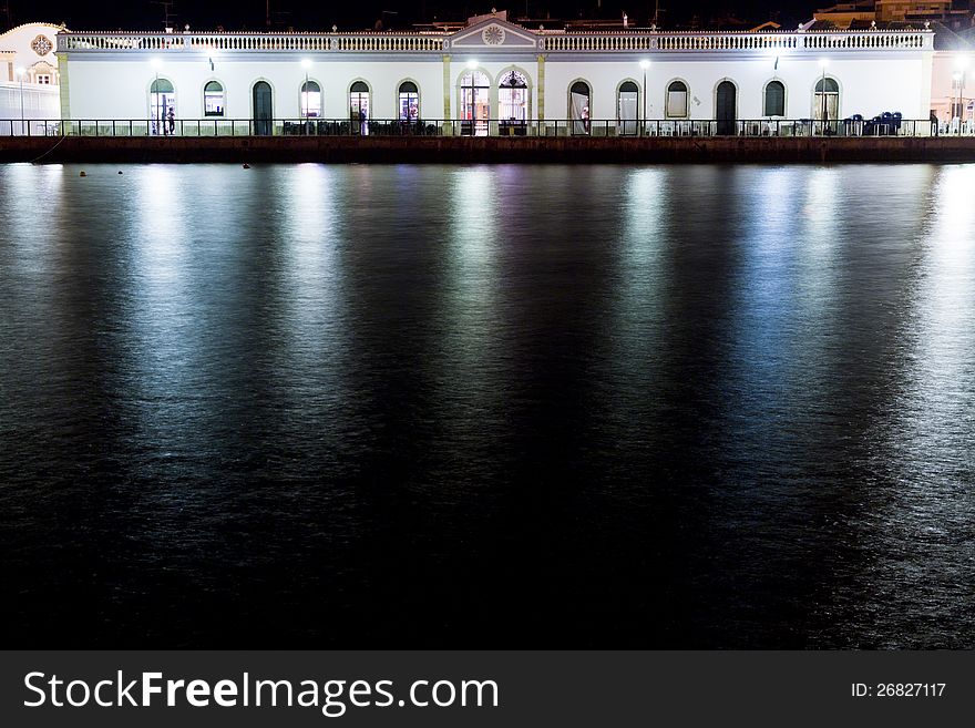 View of beautiful Tavira city in the night located in the Algarve, Portugal. View of beautiful Tavira city in the night located in the Algarve, Portugal.