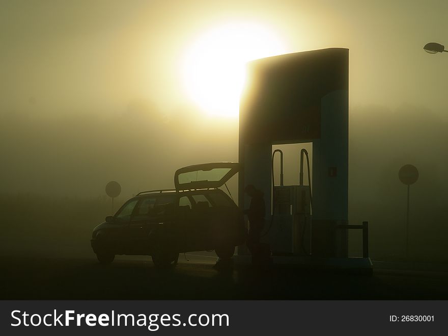 In the foggy morning at filling station. In the foggy morning at filling station