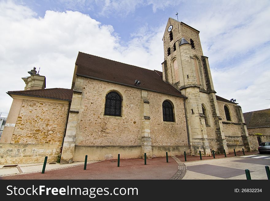 View of the wonderful church of Morangis village on the outskirts of Paris, France. View of the wonderful church of Morangis village on the outskirts of Paris, France.