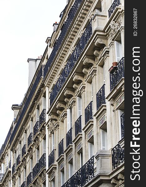 Close up section of the typical buildings of the streets of Paris, France. Close up section of the typical buildings of the streets of Paris, France.