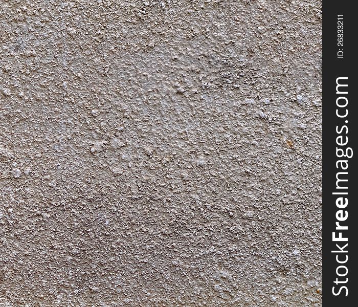 Concrete wall fragment. May be used as background or texture. Concrete wall fragment. May be used as background or texture.