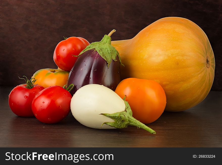 Fresh vegetables on the dark background