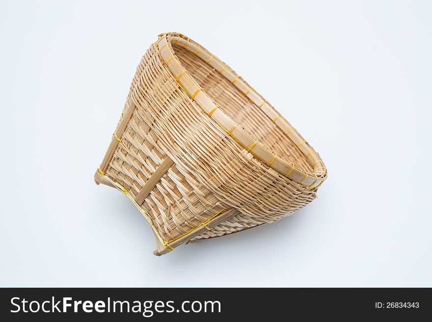 Brown wicker basket  on white background