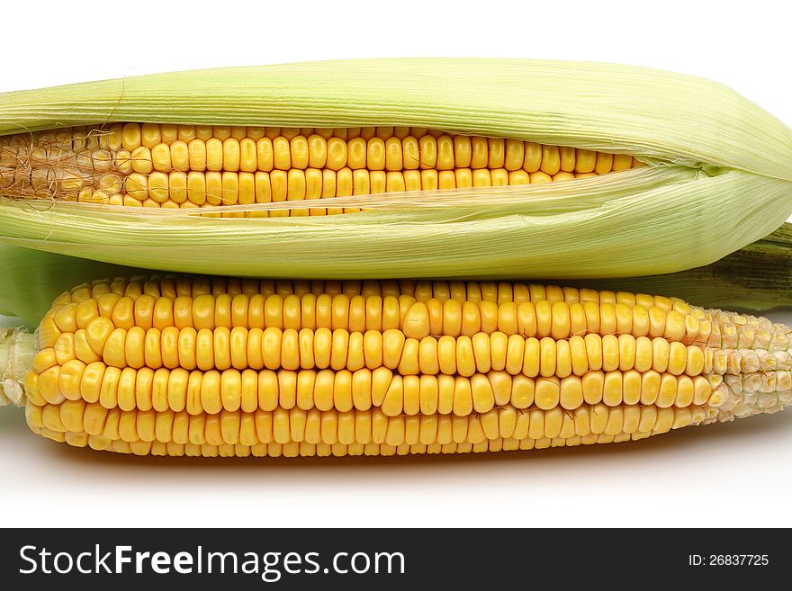 Fresh corns with green leaves