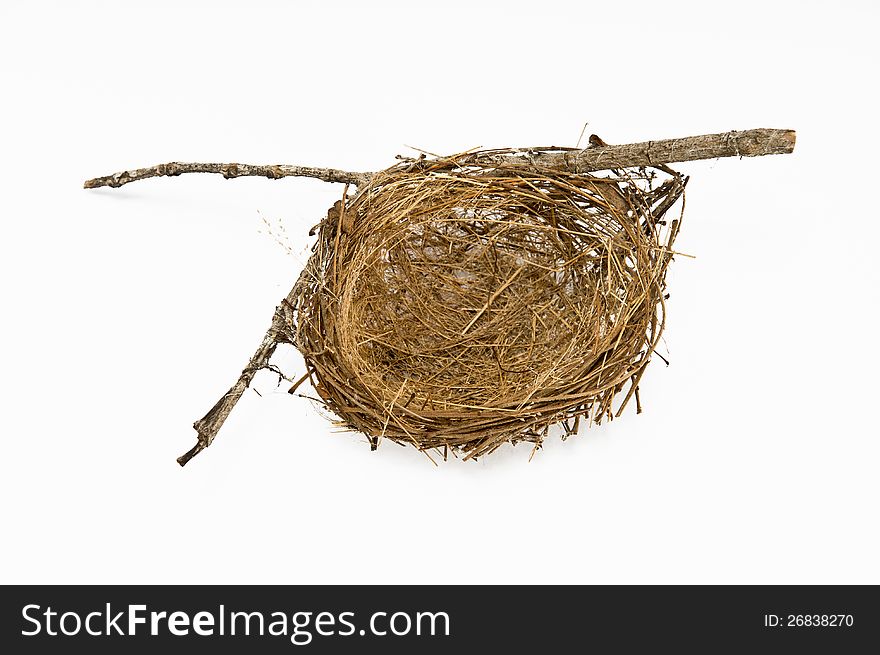 Top view of real empty bird nest on white