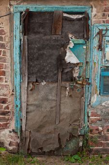 Old Dilapidated Ragged Door Royalty Free Stock Photos