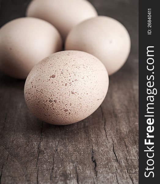 Eggs on the old wooden table. Eggs on the old wooden table