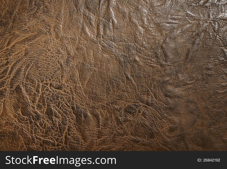 Brown leatherette texture, close-up