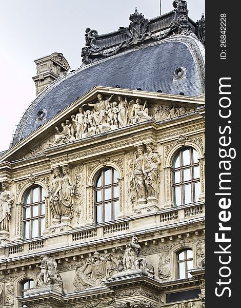 Partial view of the beautiful Museum of the Louvre in Paris, France