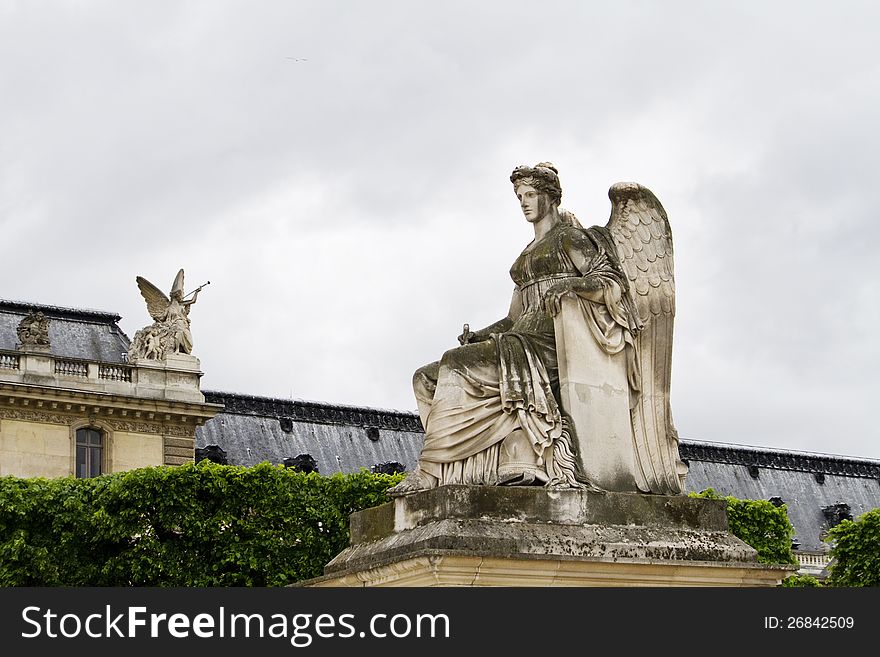 Beautiful statues located on the Avenue des Champs-Elysees in Paris, France