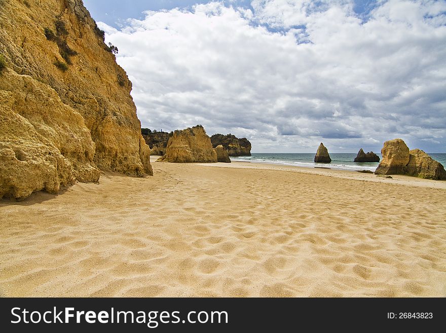 Wonderful view of a beautiful beach in the Prainha area, in the Algarve, Portugal. Wonderful view of a beautiful beach in the Prainha area, in the Algarve, Portugal.