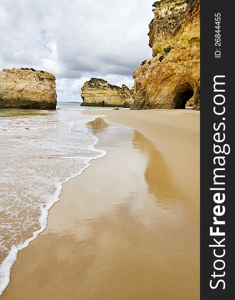 Wonderful view of a beautiful beach in the Prainha area, in the Algarve, Portugal. Wonderful view of a beautiful beach in the Prainha area, in the Algarve, Portugal.