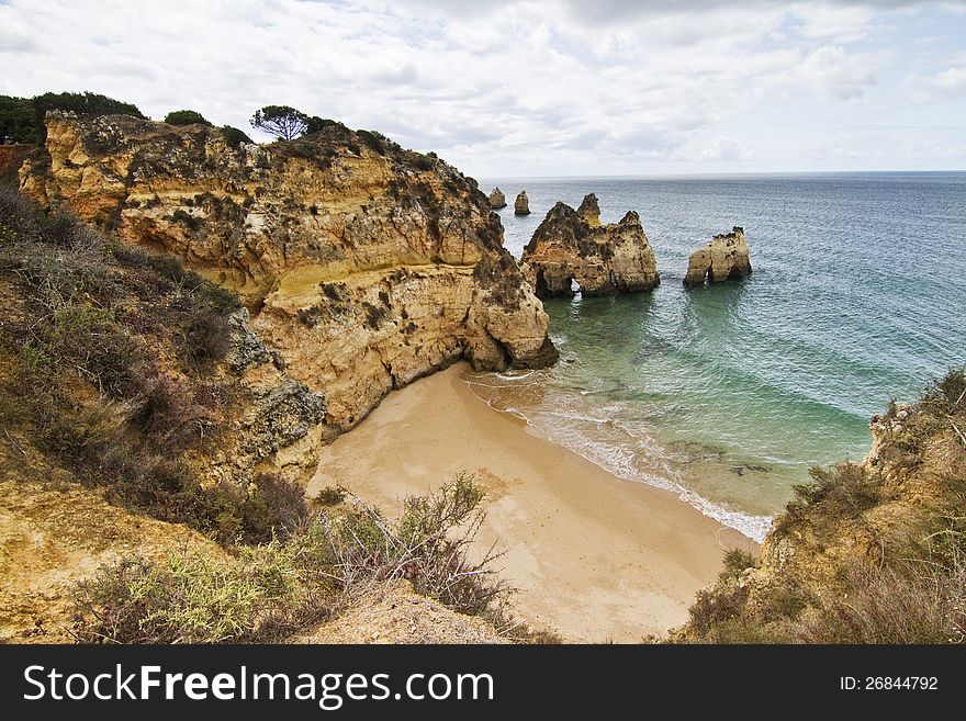 Wonderful view of a beautiful beach in the Prainha area, in the Algarve, Portugal. Wonderful view of a beautiful beach in the Prainha area, in the Algarve, Portugal.