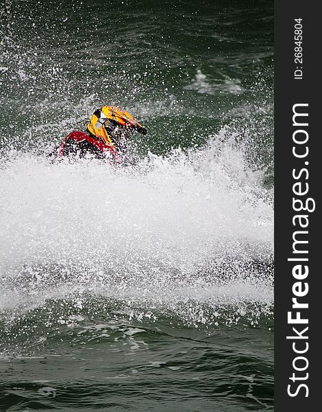 Close view of a jet boat race in the pier of Portimao city, Algarve, Portugal. Close view of a jet boat race in the pier of Portimao city, Algarve, Portugal.