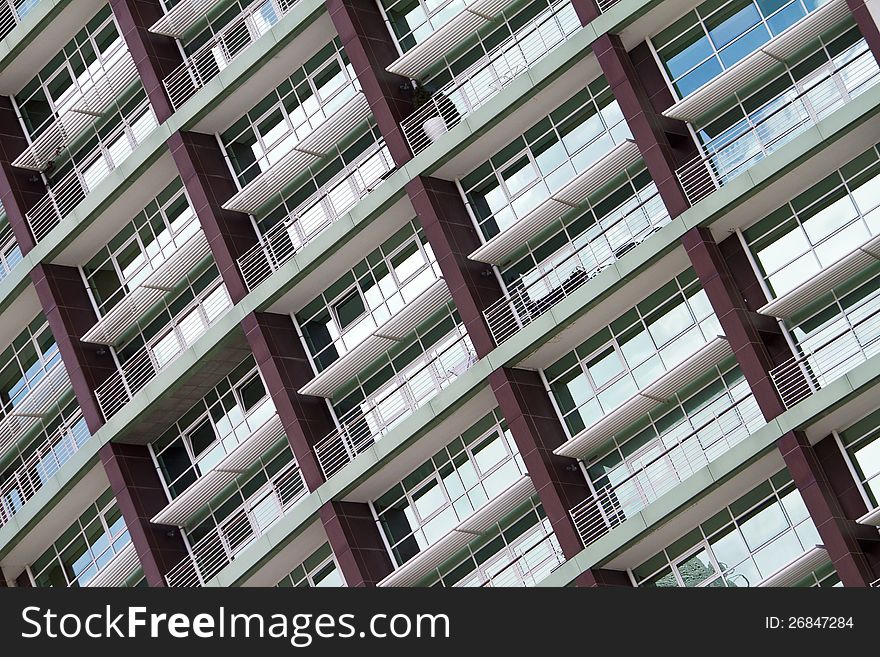 Glass detail view of the wall structure of a modern building. Glass detail view of the wall structure of a modern building.