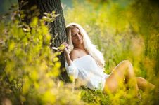Young Woman On Field In White Dress Royalty Free Stock Photography Young Woman On Field In White Dress Royalty Free Stock Photography