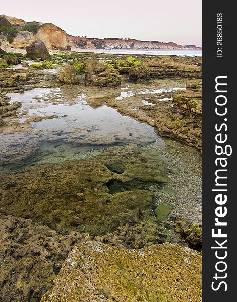 View of the beautiful coastline near Olhos D'Agua in the Algarve, Portugal. View of the beautiful coastline near Olhos D'Agua in the Algarve, Portugal.