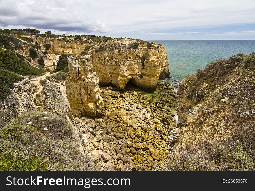 View of the beautiful coastline near Albufeira in the Algarve, Portugal. View of the beautiful coastline near Albufeira in the Algarve, Portugal.