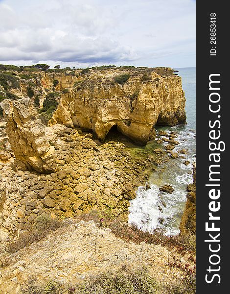 View of the beautiful coastline near Albufeira in the Algarve, Portugal. View of the beautiful coastline near Albufeira in the Algarve, Portugal.