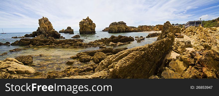 View of the beautiful coastline near Albufeira in the Algarve, Portugal. View of the beautiful coastline near Albufeira in the Algarve, Portugal.