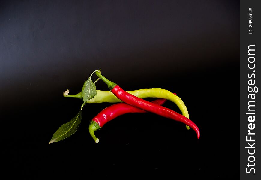 Long red and green hot spicy peppers