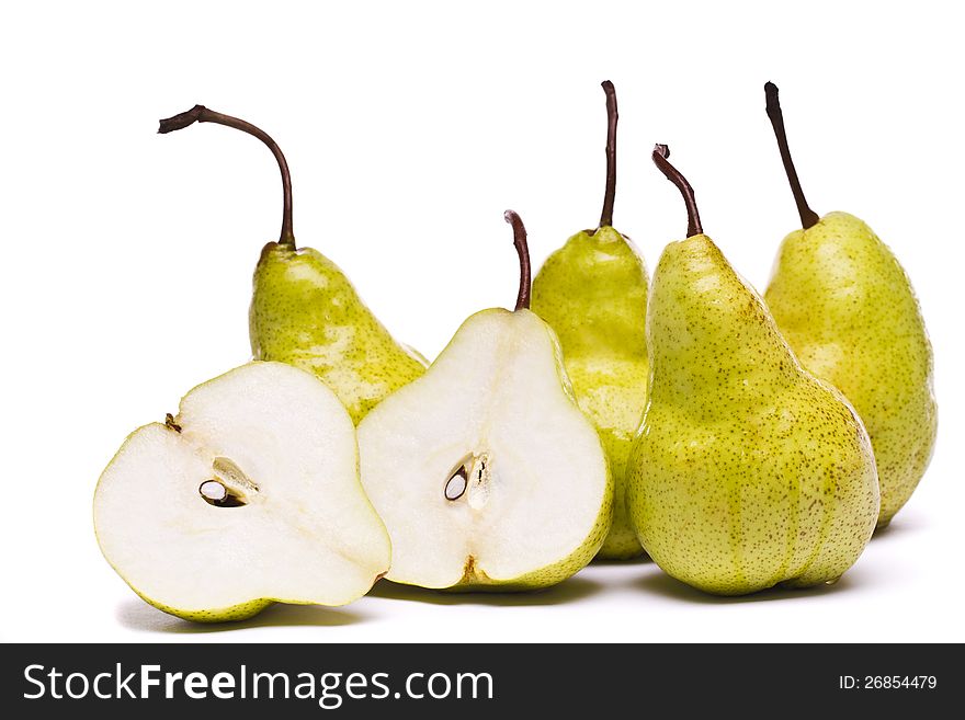 Close view of some tasty green pears isolated on a white background. Close view of some tasty green pears isolated on a white background.