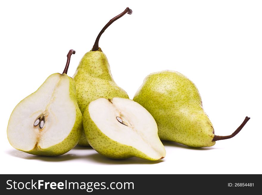 Close view of some tasty green pears isolated on a white background. Close view of some tasty green pears isolated on a white background.