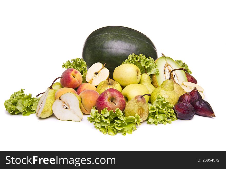 Close view of a mix of tasty fruit isolated on a white background.