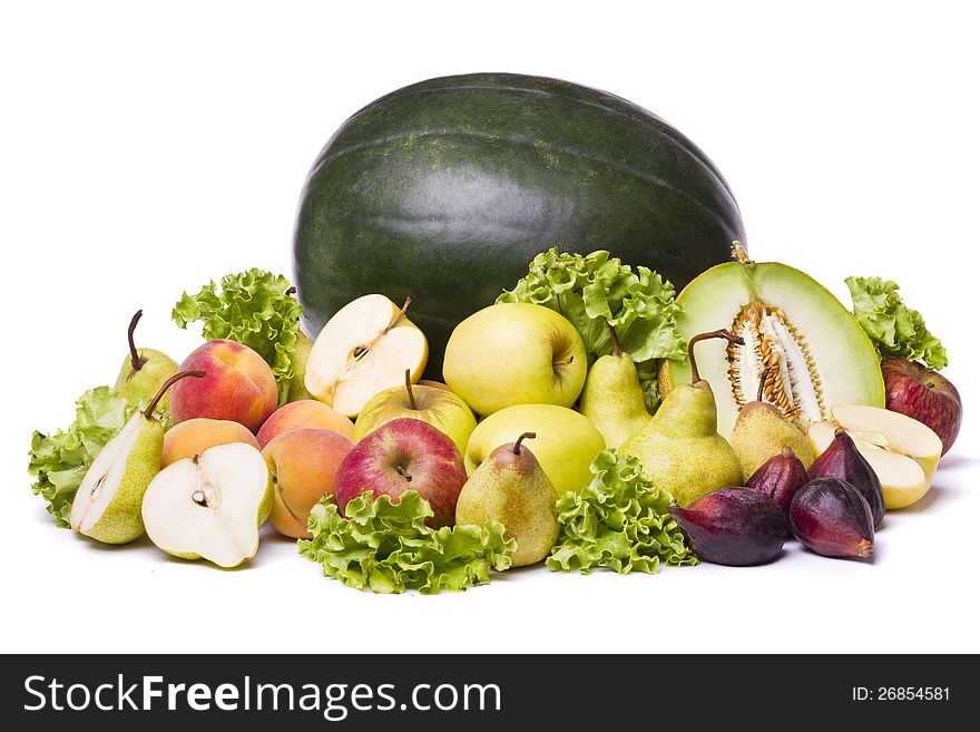 Close view of a mix of tasty fruit isolated on a white background.