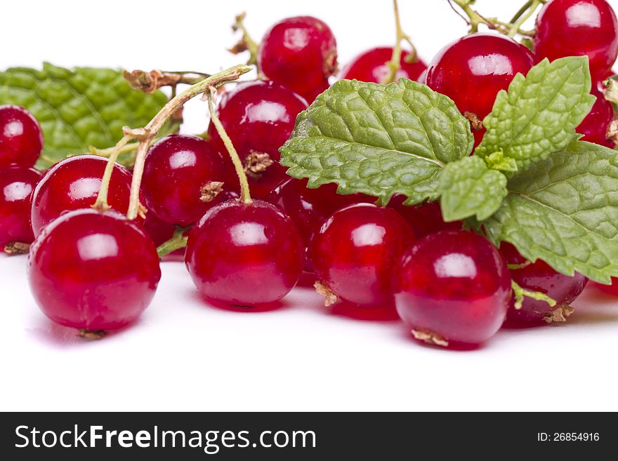 View of a bunch of tasty red currant (Ribes rubrum) berries. View of a bunch of tasty red currant (Ribes rubrum) berries.