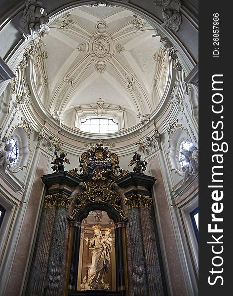 Virgin Mary baroque altar in the church of San Marco in Milan, Italy.