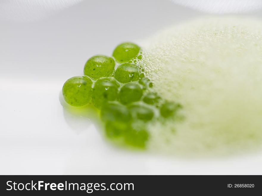 Close up view of some green caviar of a gourmet dish. Close up view of some green caviar of a gourmet dish.