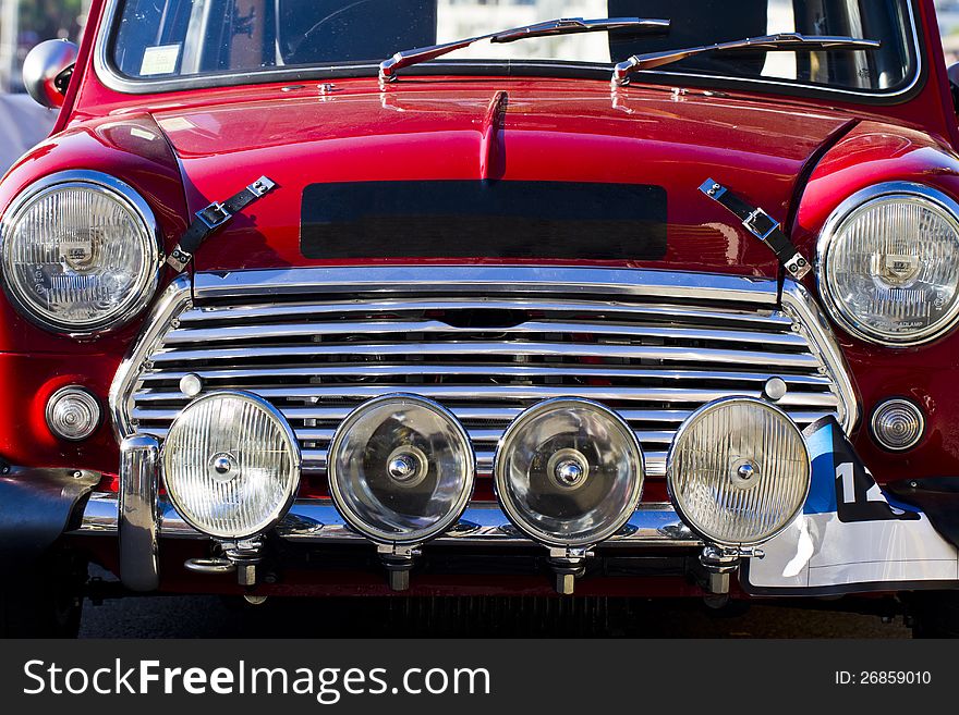 Detail view of a vintage car on display on a city. Detail view of a vintage car on display on a city.