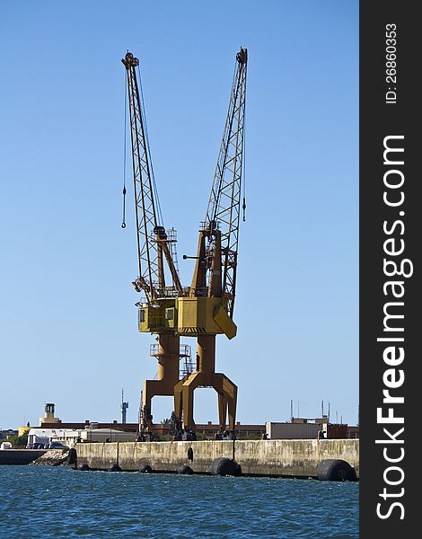 View of a port crane at the docks.