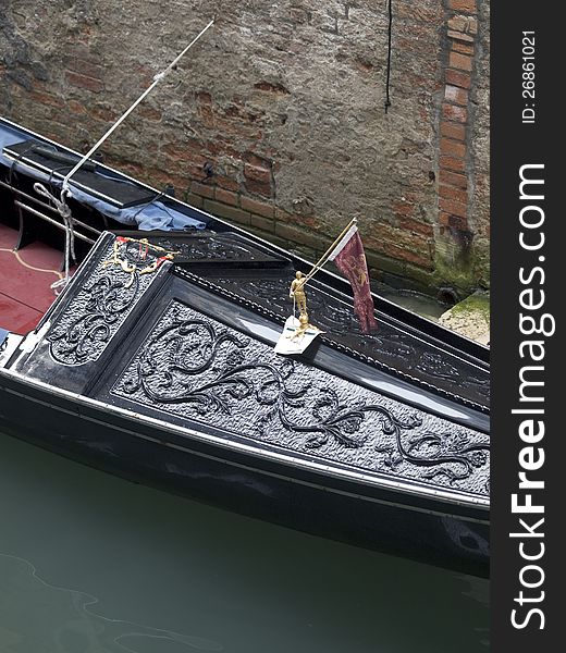 Gondola parked near the wall. Gondola parked near the wall.