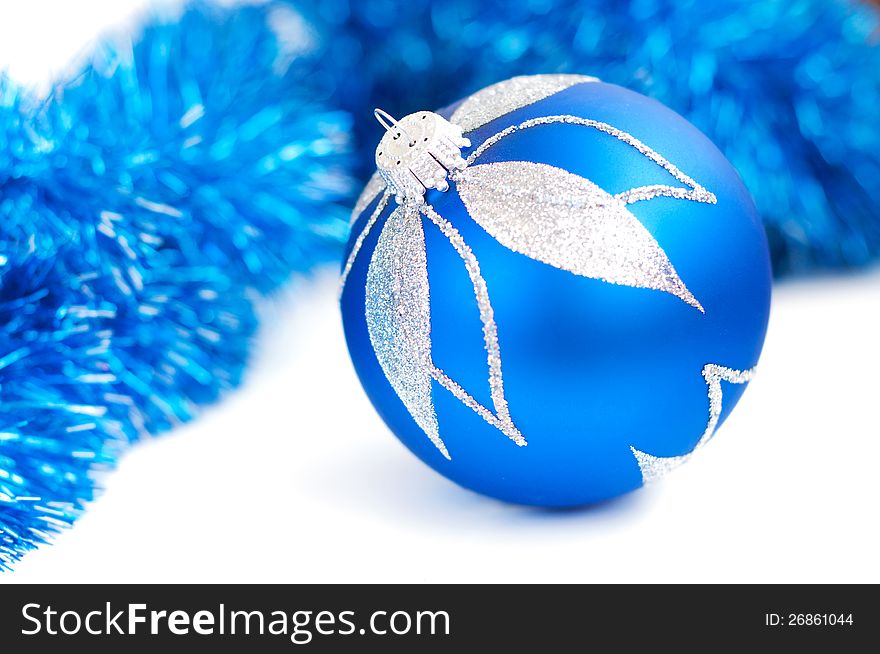 Christmas bauble  and  blue Metallic Garland. Christmas bauble  and  blue Metallic Garland