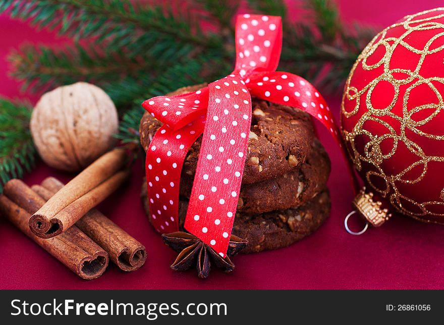 Still life with delicious Christmas cookies in red tone