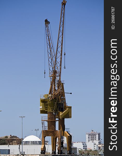 View of a port crane at the docks.