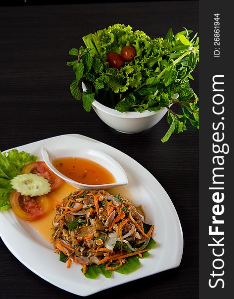 Vietnamese spicy banana blossom salad with roasted chicken