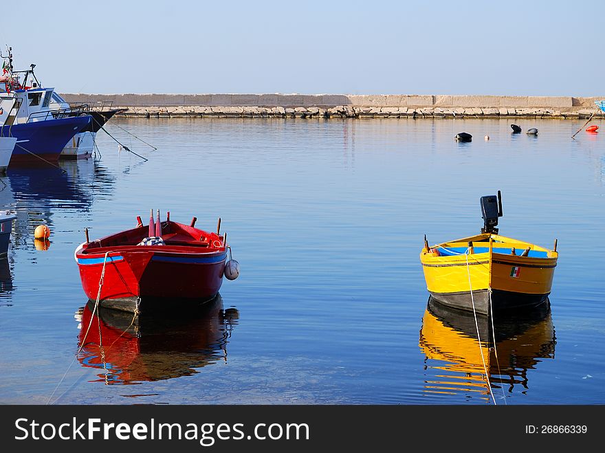 Small boats moored in the harbor of Savelletri in the province of Brindisi - Apulia