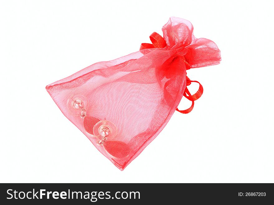 Red transparent packing for jewelry with earrings inside. Red transparent packing for jewelry with earrings inside