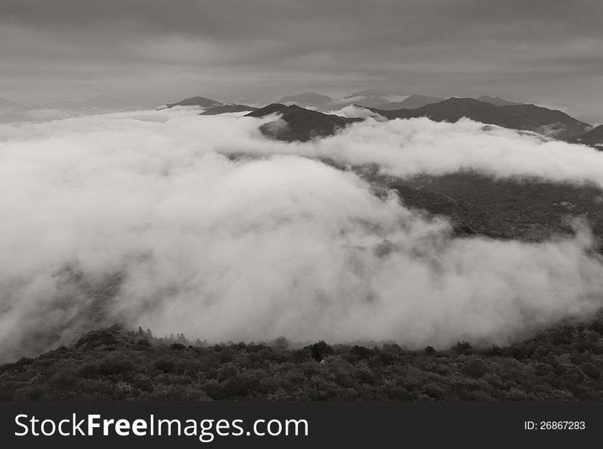 Low clouds in the valley in autumn