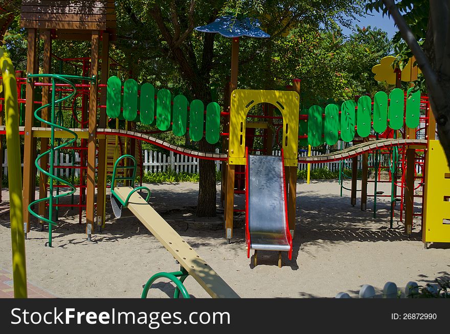 Fine playground with various attractions among trees
