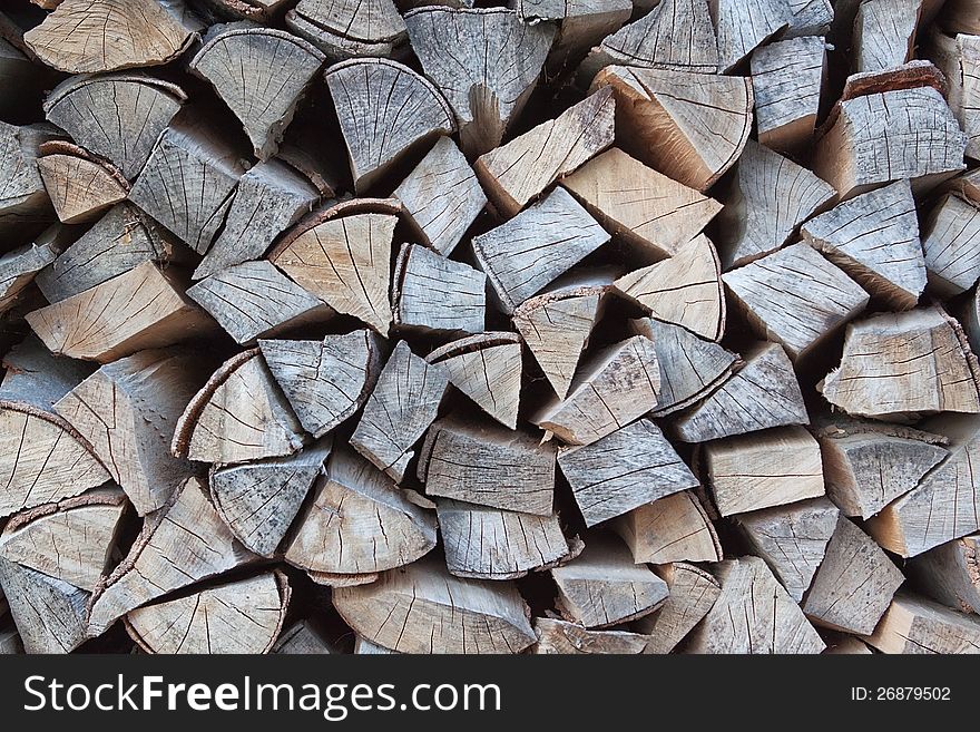 A pile of firewood for the winter. A pile of firewood for the winter.