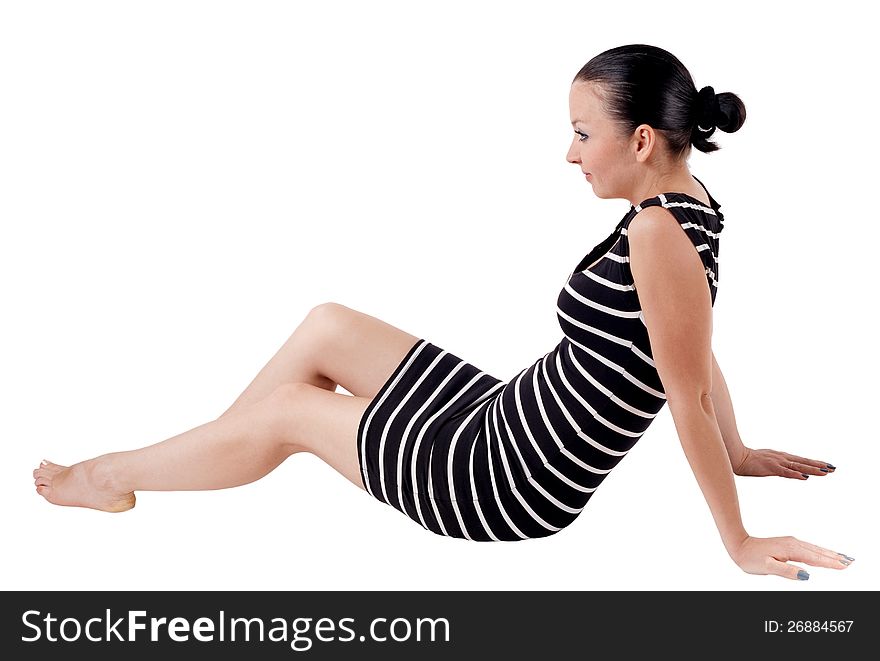 Portrait of a pretty girl posing sitting isolated white background